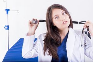 doctor holding stethoscope